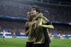 AC Milan's Ricardo Kaka, right celebrates his goal with AC Milan's Urby Emanuelson, left, during a Champions League last 16 second leg soccer match between Atletico Madrid and AC Milan, at the Vicente Calderon stadium in Madrid, Tuesday, March 11, 2014. (AP Photo/Andres Kudacki)