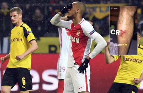 Monaco's Fabinho, center, reacts after he failed to score a penalty goal during the Champions League quarterfinal first leg soccer match between Borussia Dortmund and AS Monaco in Dortmund, Germany, Wednesday, April 12, 2017. (Federico Gambarini/dpa via AP)