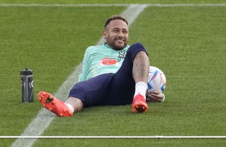 Brazil's Neymar takes a break during a training session at the Continassa sporting center, in Turin, Italy, Tuesday, Nov. 15, 2022. Brazil will compete in Group G at the 2022 FIFA World Cup. (AP Photo/Antonio Calanni)