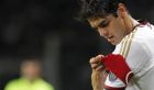AC Milan's Brazilian forward Kaka adjusts the captain arm band during the Italian Serie A football match Torino vs AC Milan on September 14, 2013 at the Olympic Stadium in Turin.  AFP PHOTO / MARCO BERTORELLO        (Photo credit should read MARCO BERTORELLO/AFP/Getty Images)