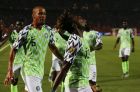 Nigeria's Samuel Chukwueze, center, celebrates after he scored during the African Cup of Nations s quarterfinal soccer match between Nigeria and South Africa in Cairo International Stadium, Egypt, Wednesday, July 10, 2019 . (AP Photo/Ariel Schalit)