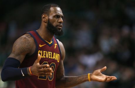 Cleveland Cavaliers forward LeBron James appeals to an official during Game 1 of the NBA basketball Eastern Conference Finals against the Boston Celtics, Sunday, May 13, 2018, in Boston. (AP Photo/Michael Dwyer)