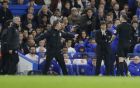 Referee Michael Oliver, right, talks with Manchester United's manager Jose Mourinho, left, and Chelsea's manager Antonio Conte, second right, during the English FA Cup quarterfinal soccer match between Chelsea and Manchester United at Stamford Bridge stadium in London, Monday, March 13, 2017 (AP Photo/Alastair Grant)