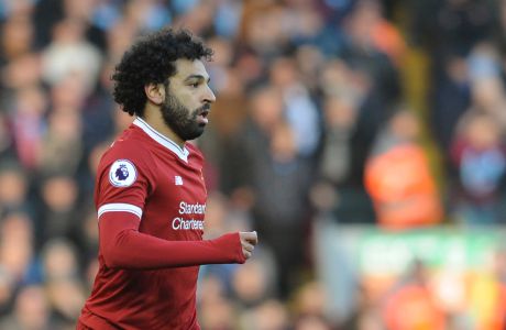 Liverpool's Mohamed Salah during the English Premier League soccer match between Liverpool and West Ham United at Anfield in Liverpool, England, Saturday, Feb. 24, 2018. (AP Photo/Rui Vieira)