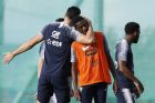 France's Adil Rami wrapped his teammate Ousmane Dembele up during a training session at the 2018 soccer World Cup in Glebovets, Russia, Saturday, July 7, 2018. (AP Photo/David Vincent)