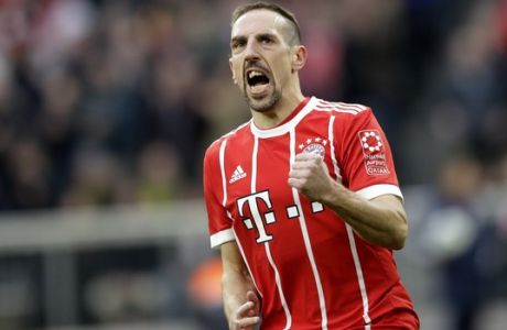 Bayern's Franck Ribery celebrates after scoring before his goal is disallowed during the German Bundesliga soccer match between FC Bayern Munich and Borussia Dortmund in Munich, Germany, Saturday, March 31, 2018. (AP Photo/Matthias Schrader)