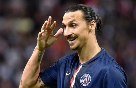 Paris Saint-Germain's Swedish forward Zlatan Ibrahimovic gestures during a French L1 football match between Reims and Paris Saint-Germain (PSG), on August 8, 2014 at the Auguste Delaune Stadium in Reims. AFP PHOTO / PHILIPPE HUGUEN        (Photo credit should read PHILIPPE HUGUEN/AFP/Getty Images)