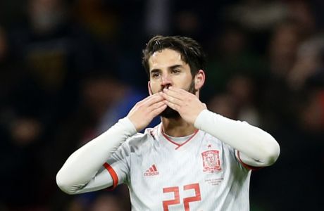 Spain's Isco Alarcon celebrates scoring his side's third goal during the international friendly soccer match between Spain and Argentina at the Wanda Metropolitano stadium in Madrid, Spain, Tuesday, March 27, 2018. (AP Photo/Francisco Seco)