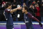 PSG's Edinson Cavani, left, and PSG's Neymar celebrate his goal during the French League One soccer match between Paris Saint Germain and Troyes, at the Parc des Princes stadium in Paris, France, Wednesday, Nov. 29, 2017. (AP Photo/Christophe Ena)
