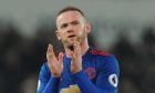 FILE - In this Jan. 21, 2017 file photo, Manchester United's Wayne Rooney acknowledges the fans after the English Premier League soccer match between Stoke City and Manchester United at the Britannia Stadium, Stoke on Trent, England.  Manchester United will play Ajax in the  Europa League final in Stockholm on Wednesday May 24, 2017. (AP Photo/Rui Vieira, File)
