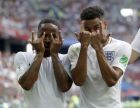 England's Jesse Lingard reacts as he celebrates with teammate England's Raheem Sterling, left, after scoring his team's third goal during the group G match between England and Panama at the 2018 soccer World Cup at the Nizhny Novgorod Stadium in Nizhny Novgorod , Russia, Sunday, June 24, 2018. (AP Photo/Matthias Schrader)
