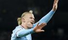 Manchester City's Erling Haaland reacts after he scored his 5th goal, the 6-0, during the Champions League round of 16 second leg soccer match between Manchester City and RB Leipzig at the Etihad stadium in Manchester, England, Tuesday, March 14, 2023. (AP Photo/Dave Thompson)