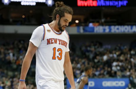 FILE - In this Jan. 25, 2017, file photo, New York Knicks' Joakim Noah (13) walks to the bench during a time out in the second half of an NBA basketball game against the Dallas Mavericks in Dallas. Noah has been suspended 20 games without pay for violating the league's anti-drug policy, the NBA announced Saturday, March 25, 2017. He tested positive for a substance found in some over-the-counter supplements, the league said. (AP Photo/Tony Gutierrez, File)