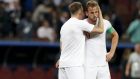England's Harry Kane, right, and England's Eric Dier react at the end of the semifinal match between Croatia and England at the 2018 soccer World Cup in the Luzhniki Stadium in Moscow, Russia, Wednesday, July 11, 2018. (AP Photo/Rebecca Blackwell)