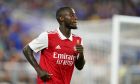 Arsenal forward Nicolas Pepe jogs during the second half of a pre-season friendly soccer match against Everton, Saturday, July 16, 2022, in Baltimore. Arsenal won 2-0. (AP Photo/Julio Cortez)