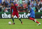 Portugal's Cristiano Ronaldo, left, drives the ball next to France's Paul Pogba during the Euro 2016 final soccer match between Portugal and France at the Stade de France in Saint-Denis, north of Paris, Sunday, July 10, 2016. (AP Photo/Thanassis Stavrakis)