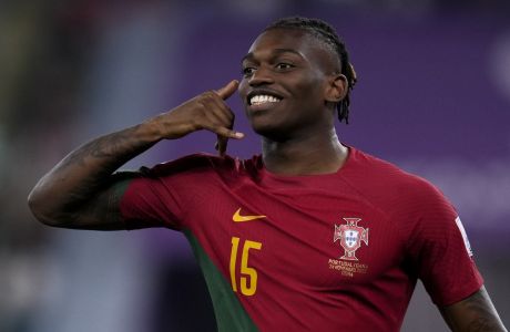 Portugal's Rafael Leao celebrates scoring his side's third goal against Ghana during a World Cup group H soccer match at the Stadium 974 in Doha, Qatar, Thursday, Nov. 24, 2022. (AP Photo/Manu Fernandez)