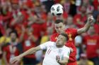 England's Jamie Vardy, foreground, and Belgium's Thomas Vermaelen jump to head the ball during the group G match between England and Belgium at the 2018 soccer World Cup in the Kaliningrad Stadium in Kaliningrad, Russia, Thursday, June 28, 2018. (AP Photo/Petr David Josek)