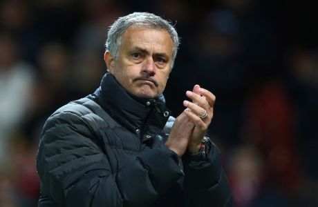 Manchester United's manager José Mourinho applauds the fans as he walks off the pitch after the end of the Europa League group A soccer match between Manchester United and Feyenoord at the Old Trafford in Manchester, England, Thursday, Nov. 24, 2016. United won the game 4-0. (AP Photo/Dave Thompson)