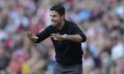 Arsenal's manager Mikel Arteta gestures to players during the English Premier League soccer match between Arsenal and Manchester United at Emirates stadium in London, Sunday, Sept. 3, 2023. (AP Photo/Kirsty Wigglesworth)