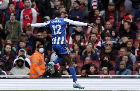 Brighton's Enock Mwepu celebrates after scoring his side's second goal during the English Premier League soccer match between Arsenal and Brighton and Hove Albion at Emirates stadium in London, Saturday, April 9, 2022. (AP Photo/Ian Walton)