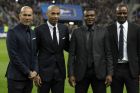 Former France's soccer players Zinedine Zidane, Thierry Henry, Marcel Desailly and Patrick Vieira, from left, are honored prior to the international friendly soccer match between France and Brazil at the Stade de France, north of Paris, France, Thursday, March 26, 2015. (AP Photo/Francois Mori)