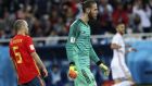 Spain goalkeeper David De Gea, center, and Spain's Andres Iniesta, left, react after Morocco's Khalid Boutaib, background right, scores the opening goal during the group B match between Spain and Morocco at the 2018 soccer World Cup at the Kaliningrad Stadium in Kaliningrad, Russia, Monday, June 25, 2018. (AP Photo/Czarek Sokolowski)