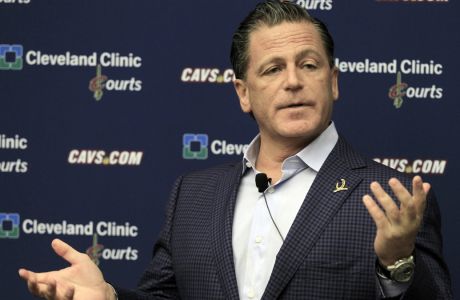 Cleveland Cavaliers owner Dan Gilbert  answers questions during a news conference at the team's training facility, Wednesday, May 9, 2012, in Independence, Ohio. Gilbert says "nothing in the NBA surprises" him, so he was not shocked when superstar LeBron James said he could envision playing again for Cleveland. (AP Photo/Tony Dejak)