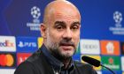 Manchester City's head coach Pep Guardiola talks to the media at a press conference prior the Champions League Group G soccer match between Borussia Dortmund and Manchester City in Dortmund, Germany, Monday, Oct. 24, 2022. (AP Photo/Martin Meissner)
