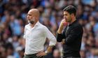 Manchester City's manager Pep Guardiola, left, and Arsenal's manager Mikel Arteta during the English FA Community Shield final soccer match between Arsenal and Manchester City at Wembley Stadium in London, Sunday, Aug. 6, 2023. (AP Photo/Kirsty Wigglesworth)