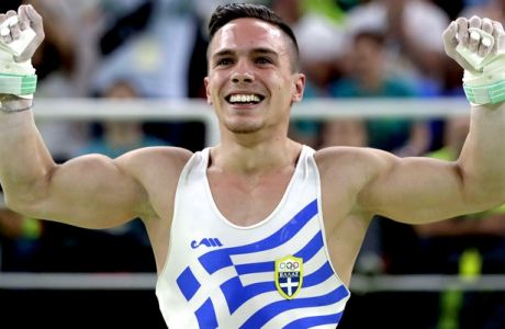 Greece's Eleftherios Petrounias celebrates after his performance on the rings during the artistic gymnastics men's apparatus final at the 2016 Summer Olympics in Rio de Janeiro, Brazil, Monday, Aug. 15, 2016. (AP Photo/Julio Cortez)