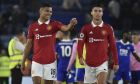 Manchester United's Casemiro, left, and Cristiano Ronaldo leave the pitch after the English Premier League soccer match between Leicester City and Manchester United at King Power stadium in Leicester, England, Thursday, Sept. 1, 2022. Manchester United won 1-0. (AP Photo/Rui Vieira)