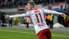Leipzig's Timo Werner celebrates after scoring his side's 2nd goal during the Europa League round of sixteen first leg soccer match between RB Leipzig and FC Zenit St. Petersburg in Leipzig, Germany, Thursday, March 8, 2018. (AP Photo/Jens Meyer)