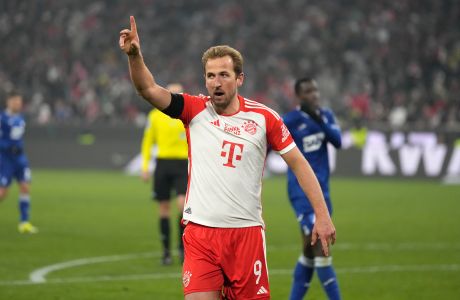 Bayern's Harry Kane celebrates after scoring his side's second goal during the German Bundesliga soccer match between FC Bayern Munich and TSG 1899 Hoffenheim at the Allianz Arena in Munich, Germany, Friday, Jan. 12, 2024. (AP Photo/Matthias Schrader)