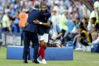 France head coach Didier Deschamps hugs Kylian Mbappe during the round of 16 match between France and Argentina, at the 2018 soccer World Cup at the Kazan Arena in Kazan, Russia, Saturday, June 30, 2018. (AP Photo/David Vincent)
