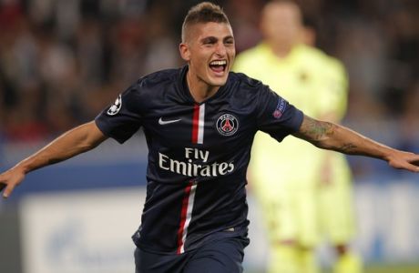 PSG's Marco Verratti celebrates after scoring his side's second goal during the Champions League soccer match between PSG and Barcelona, at the Parc des Princes stadium, in Paris, Tuesday, Sept. 30, 2014. (AP Photo/Christophe Ena)