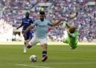 Manchester City's Sergio Aguero attempts a shot on goal during the Community Shield soccer match between Chelsea and Manchester City at Wembley, London, Sunday, Aug. 5, 2018. (AP Photo/Tim Ireland)