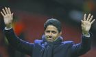FILE - Paris Saint Germain owner Nasser bin Ghanim Al-Khelaifi waves to his teams fans after the end of the Champions League round of 16 soccer match between Manchester United and Paris Saint Germain at Old Trafford stadium in Manchester, England, Tuesday, Feb. 12, 2019. Nasser al-Khelaïfi was acquitted Friday, June 24, 2022, for a second time by Swiss federal judges in a retrial of alleged wrongdoing linked to former FIFA secretary general Jérôme Valcke. (AP Photo/Dave Thompson, File)
