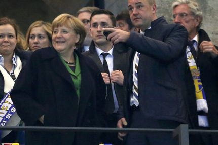 Το “πικρό” χαμόγελο της Μέρκελ